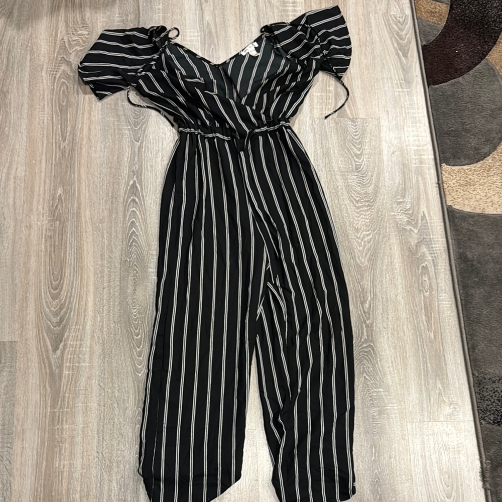 Urban Heritage Black and White Jumpsuit with Plunging Neckline and Flowy Sleeves
